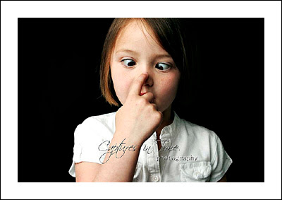 Kansas City Child Photographer girl crossing eyes