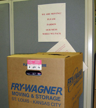 [Sign-with-moving-boxes.jpg]