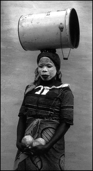 [Pete-Turner-woman-african-bucket.gif]