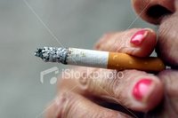 [ist2_736438_old_woman_smoking.jpg]