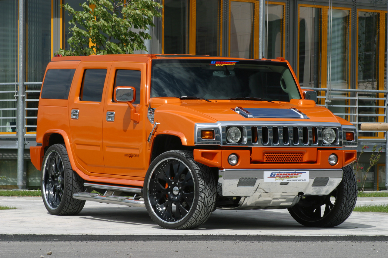 [pimped+custom+orange+Hummer+H2.jpg]