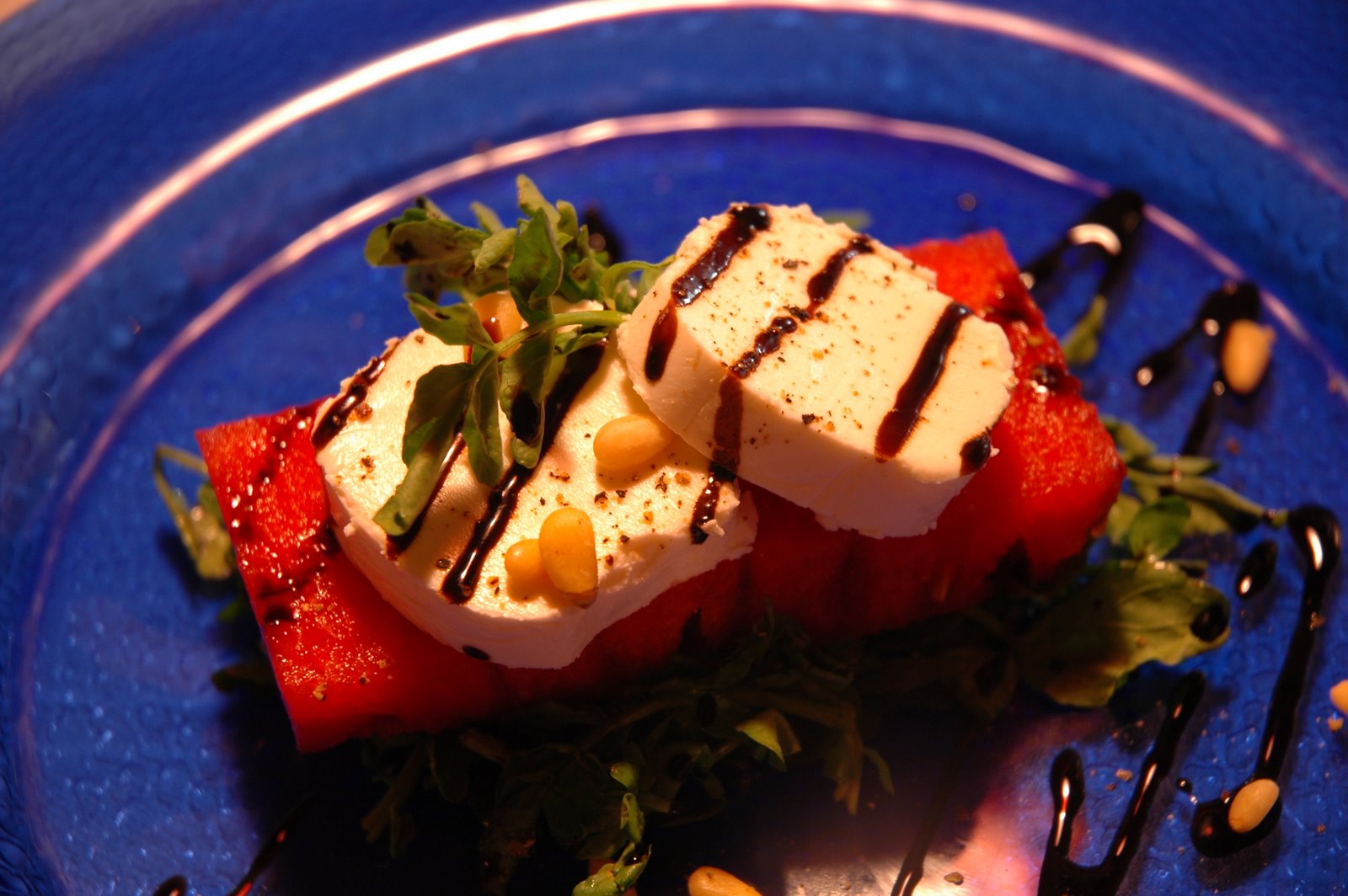 [watermelon+and+mild+mexican+goat+cheese+on+watercress+salad+with+honey-balsamic+reduction.JPG]
