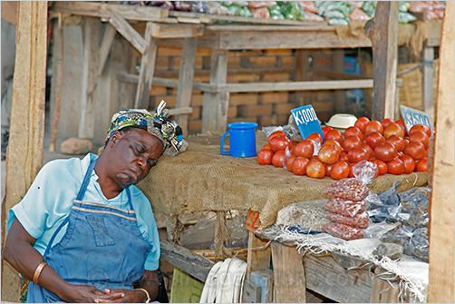 Sleeping market seller, Zambia Africa