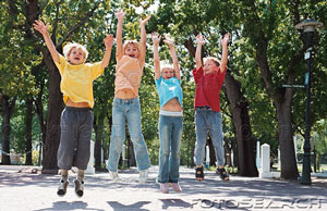 [children-jumping-in-a-city-park-~-CTK015.jpg]