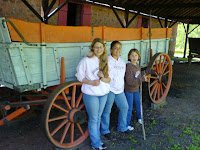 Girls in from of the Wagon I have picture of ME at 8 yrs old in front of!