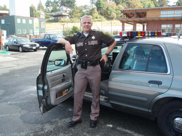 [Kevin+and+his+cop+car.JPG]