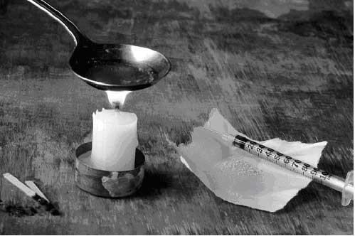 [heroin-needle-and-candle.jpg]