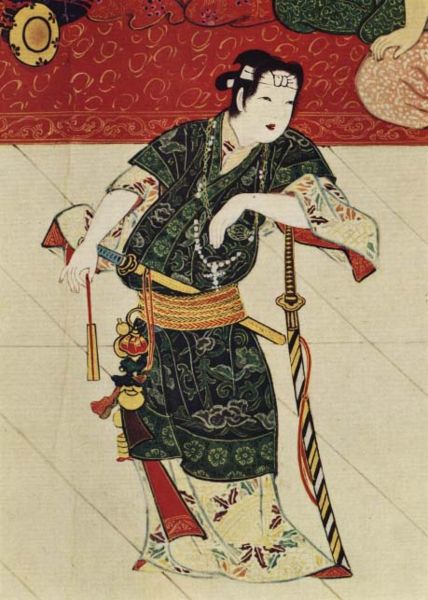 [1572Okuni_with_cross_dressed_as_a_samurai.jpg]