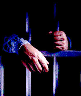 [man_behind_bars.jpg]