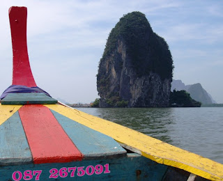 View from our longtail - just call that number for Phang Nga longtail boat service...
