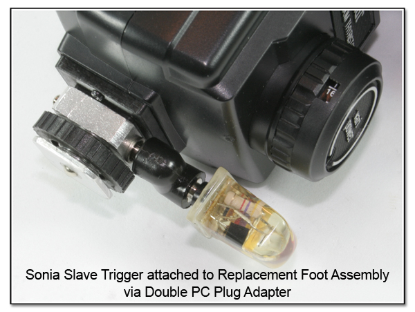 PJ1083: Sonia Optical Slave Trigger attached to Replacement Foot Assembly via Double PC Plug Adapter
