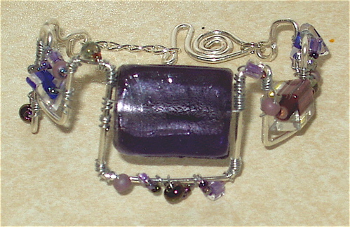 [3:1:07+purple+bracelet.JPG]