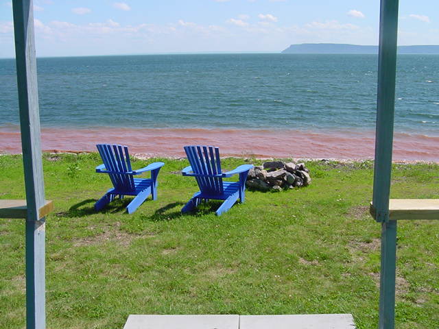 [parrsboro+blue+chairs+and+red+water.JPG]