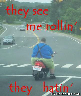 fat_man_on_a_bike_they_see_.jpg