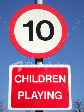 [ist2_1560738_children_playing_road_sign.jpg]