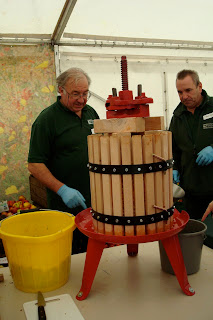 Pressing apples at the Autumn Fair