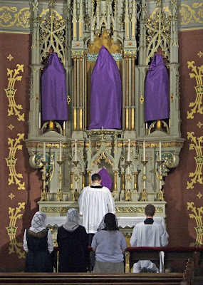 Saint Francis de Sales Roman Catholic Oratory, in Saint Louis, Missouri, USA - shrouded statues on Saint Joseph's altar
