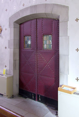 Saint Luke the Evangelist Church, in Richmond Heights, Missouri - red leather interior door