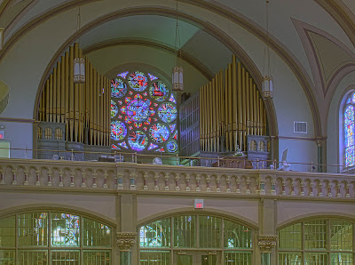Saint Charles Borromeo Roman Catholic Church, in Saint Charles, Missouri, USA - Pipe organ and rose window in choir loft