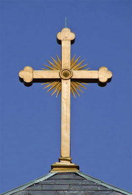 Holy Family Roman Catholic Church, in Port Hudson, Missouri, USA - golden cross on tower