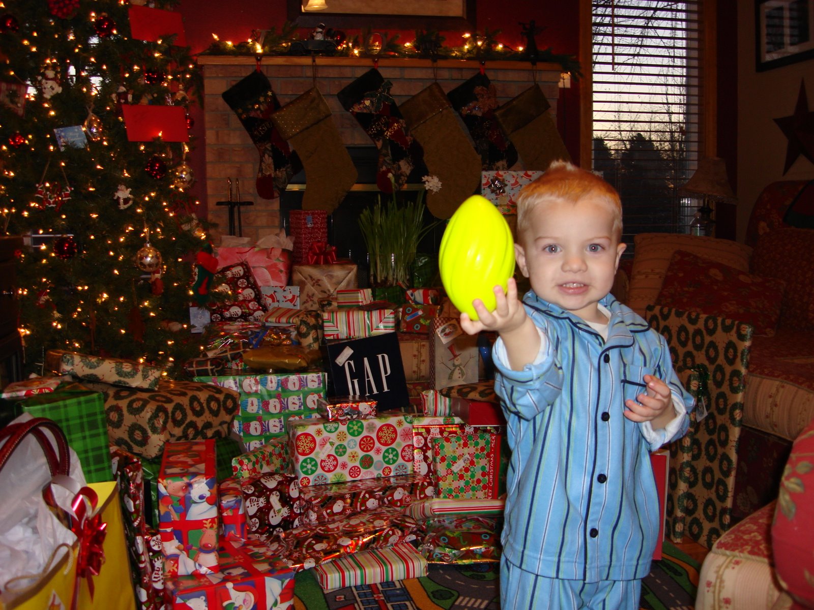 Keaton and his football he got for Christmas