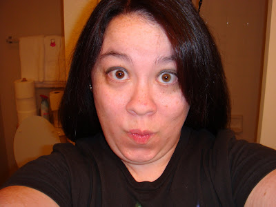 dark hair with pink highlights. the pink highlights a few blog entries lower than this one now does it?