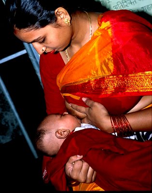 [Image+of+Portrait+of+a+young+baby+breast-feeding+India+normal_photo.jpg]