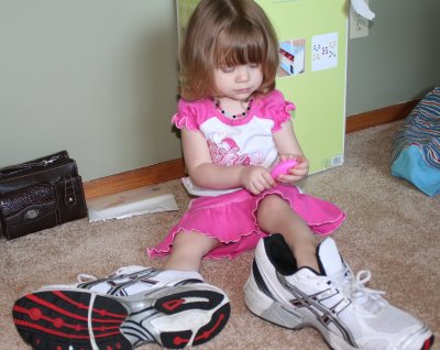 [allie+in+grandpas+shoes.jpg]