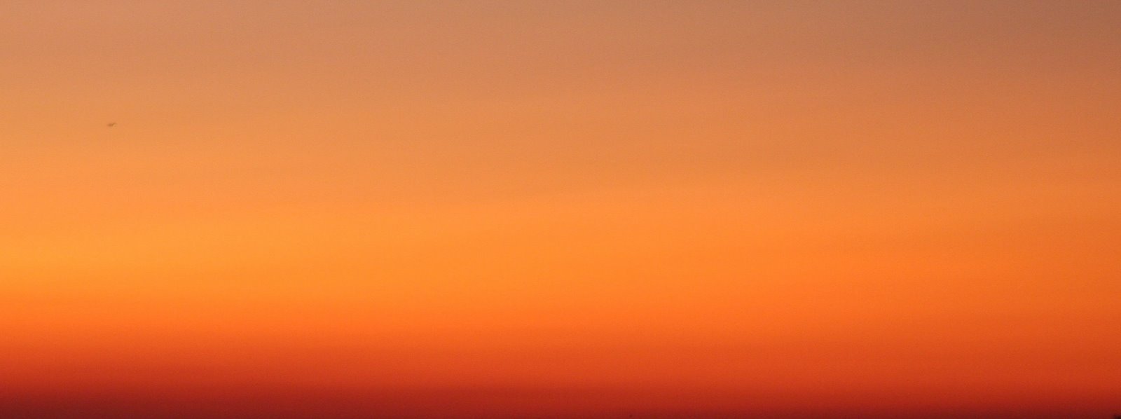 [Sunset+with+plane.jpg]