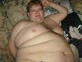 [fat+man+on+bed.jpg]