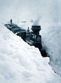 [200px-Train_stuck_in_snow.jpg]