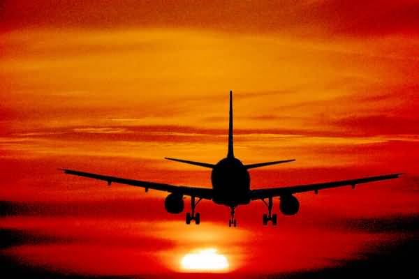 [aeroplane+in+sunset.jpg]
