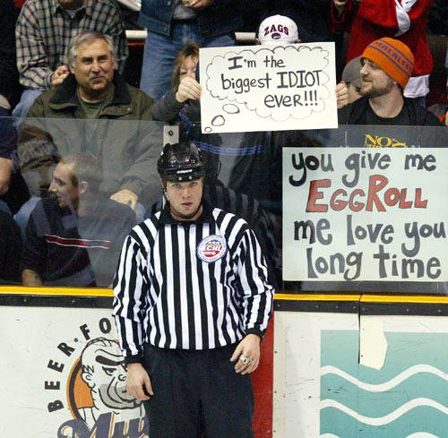 [hockey-game-referee-humorous-fan-holding-sign-biggest-idiot-ever.jpg]