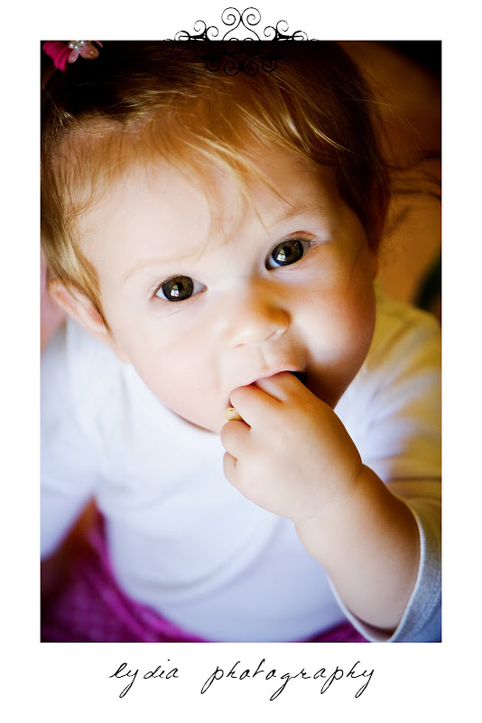 Baby with hand in mouth at lifestyle baby portraits in Grass Valley, California