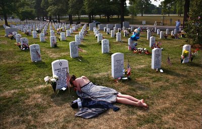 [mourning+It+was+this+picture+by+John+Moore+of+a+woman+at+Arlington+National+Cemetery+mourning+her+fiance+who+was+killed+in+Iraq..jpg]