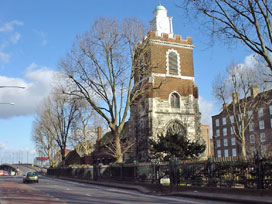 Bow Church, in the middle of the A11, with the Bow flyover in the distance