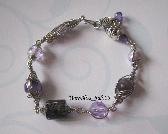 [Wire+Wrapped+Purple+Pendant.JPG]