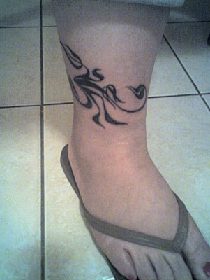 arm tattoos - live life love life tattoo. arm butterfly tatoo. arm tattoos