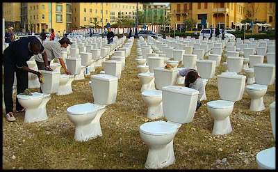 toilet seats arranged as part of event commemorating lebanese civil war