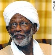 [AP_Sudans_Islamist_opposition_leader_Dr_Shaikh_Hassan_Al_Turabi_talks_to_the_press_in_Doha_eng_190_20oct05.jpg]