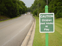 Life at Spruce Creek: CAUTION Children and Adults at Play