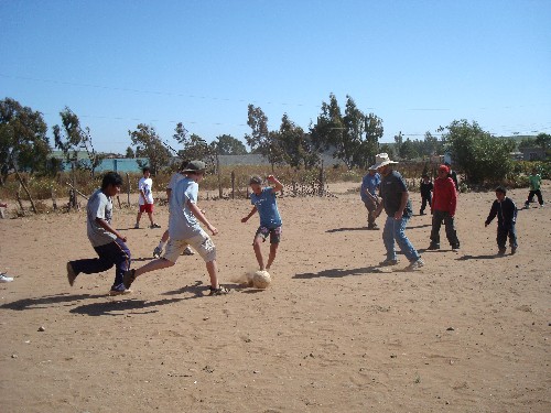 [playing_soccer_with_mexican_children-745075.jpg]
