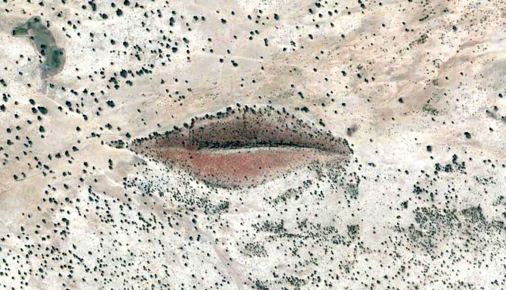 Un relief étrange nous fait voir la terre avec une bouche (Ouest Soudan)