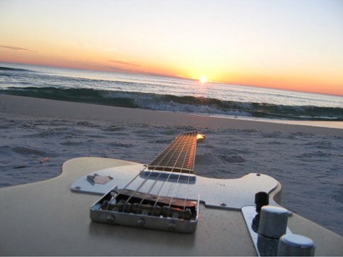 [guitar+on+beach.jpg]