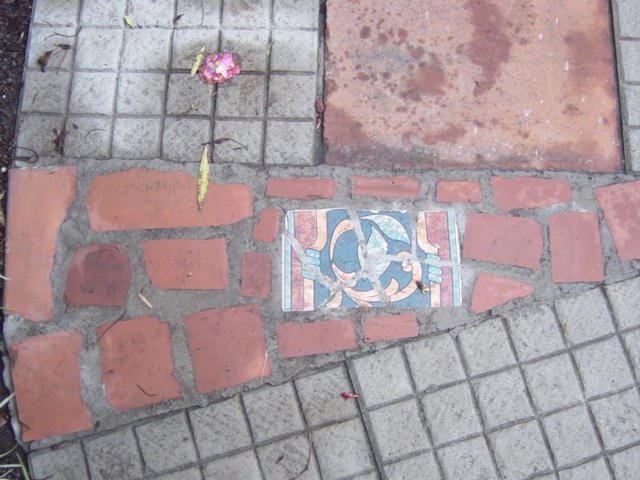 [mexico+tile+sidewalk+in+garden.JPG]