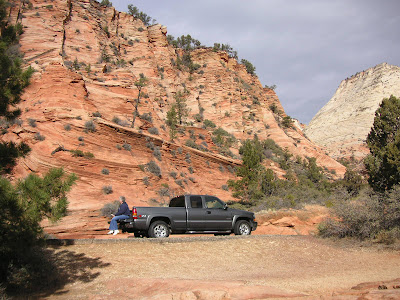 Nellie Lee having lunch on the tailgate in Zion National Park