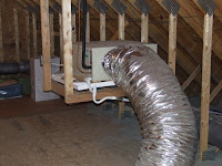 picture of attic air handler supported from trusses