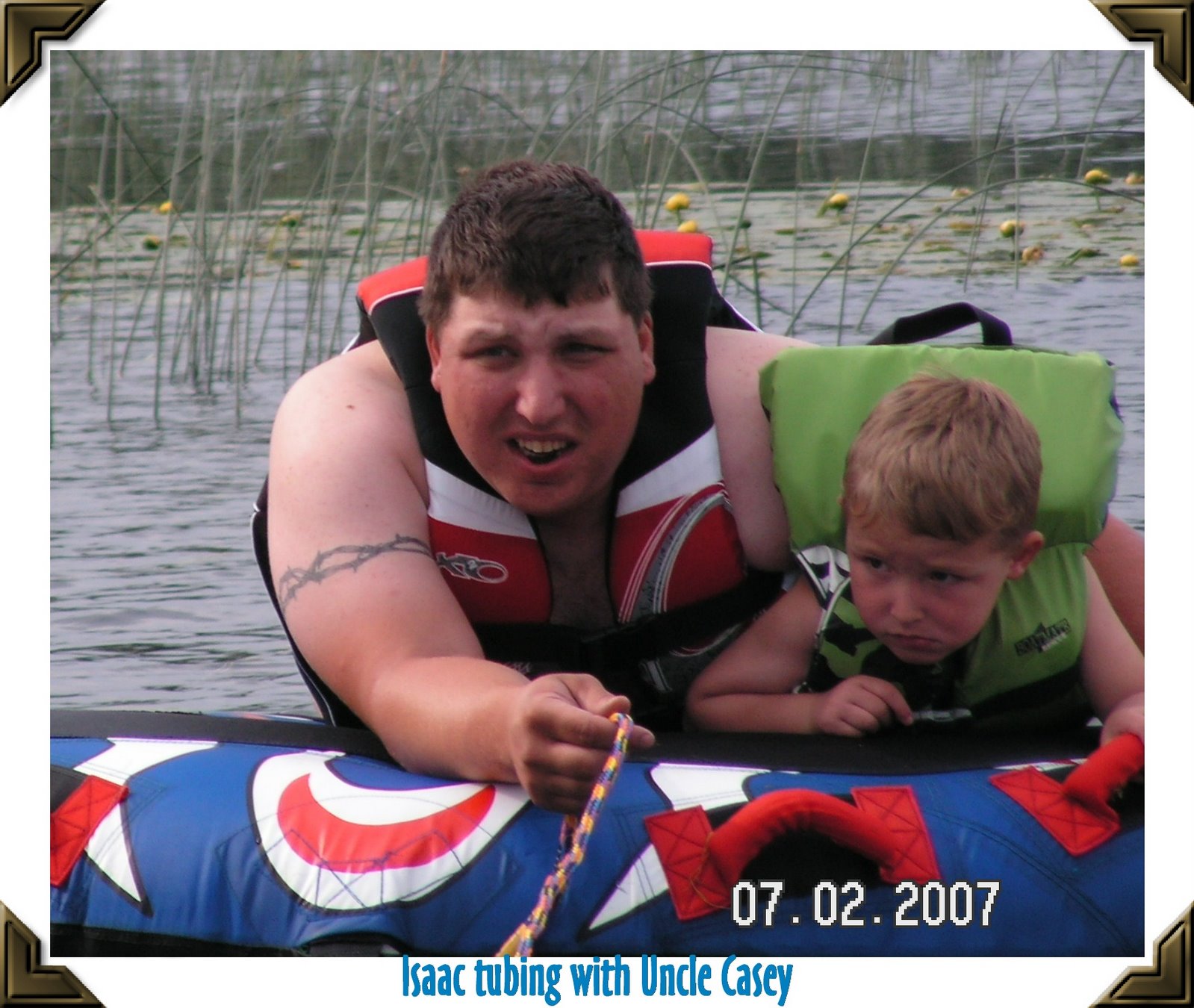 [Isaac+tubing+with+uncle+casey.jpg]