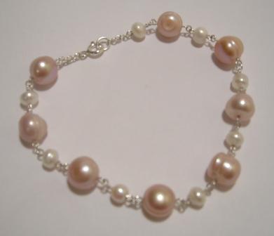 [pink+pearls+silver+bracelet.jpg]