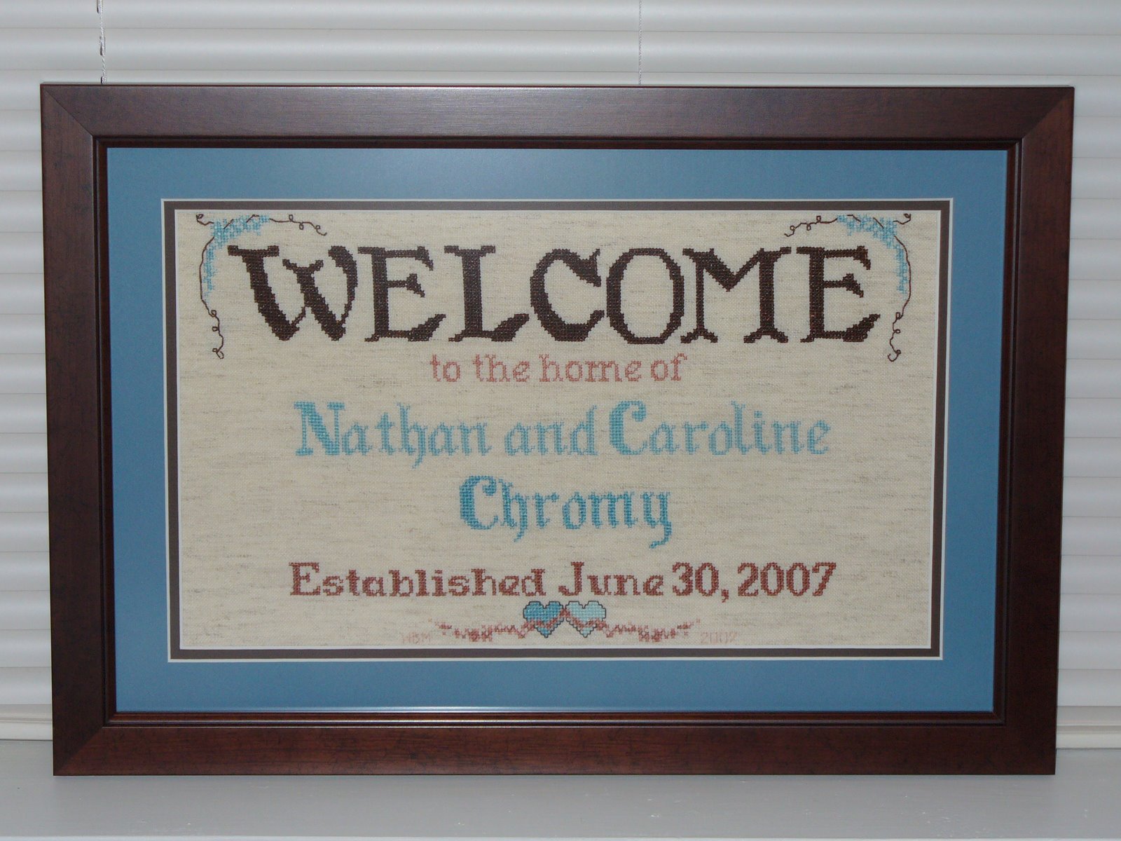 [Nathan&Caroline's+x-stitch+06-22-07.JPG]